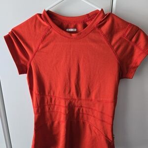 Lululemon Swiftly Tech Short-Sleeve Shirt 2.0 in a red color. Child Large